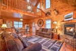 Living Room Features Flat Screen TV, Gas Fireplace and Access to Cover Deck